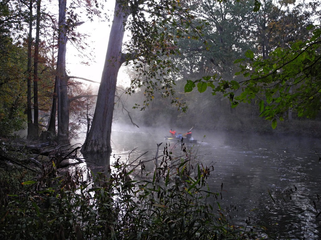 Canoe Launch A team heads out into the cold morning fog.