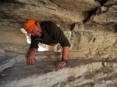 Me climbing back through the hole in the wall to head out.