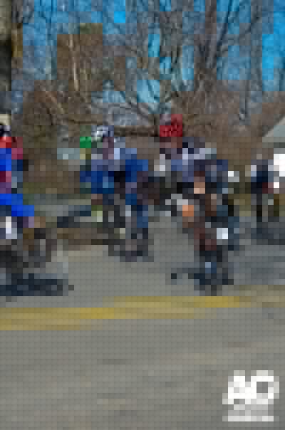 Cat 1/2/Pro riders taking the first turn.