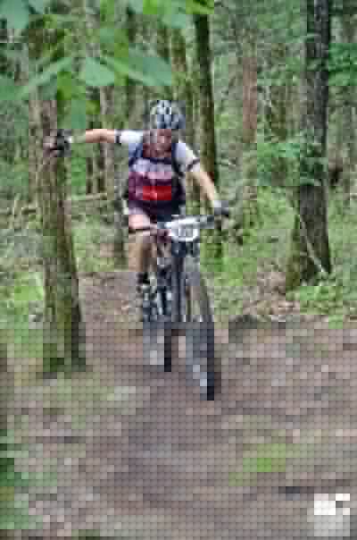 Tammy Hottinger getting an assist on the climb.