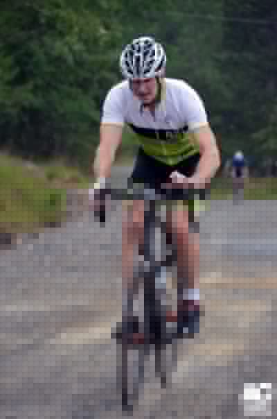 A 901 Racing rider tops the final gravel hill.
