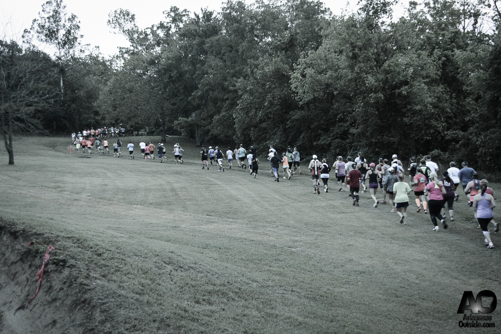 The line of runners snaking off into the woods.