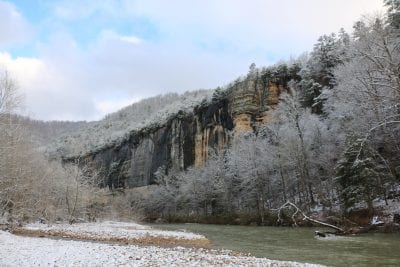 A snow-laden bank of the Buffalo River beneath Roark Bluff. Photo: National Park Service