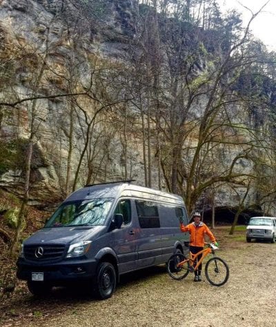 James showing off his van, "Large Marge" while at a mountain bike event at Blanchard Springs.