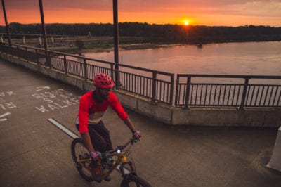 Mountain Biker crossing the Big Dam Bridge