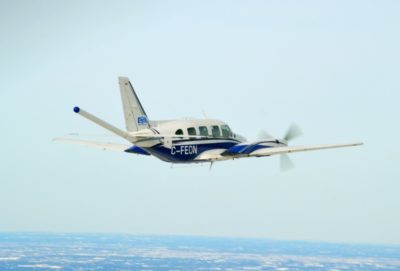 A geophysical survey airplane with a tail stinger magnetometer. Credit: Courtesy EON
