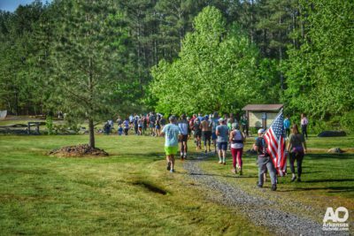 10K Runners heading down the trail from the start in Cedar Glades.