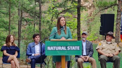 Governor Sanders speaking at Pinnacle Mountain State Park.