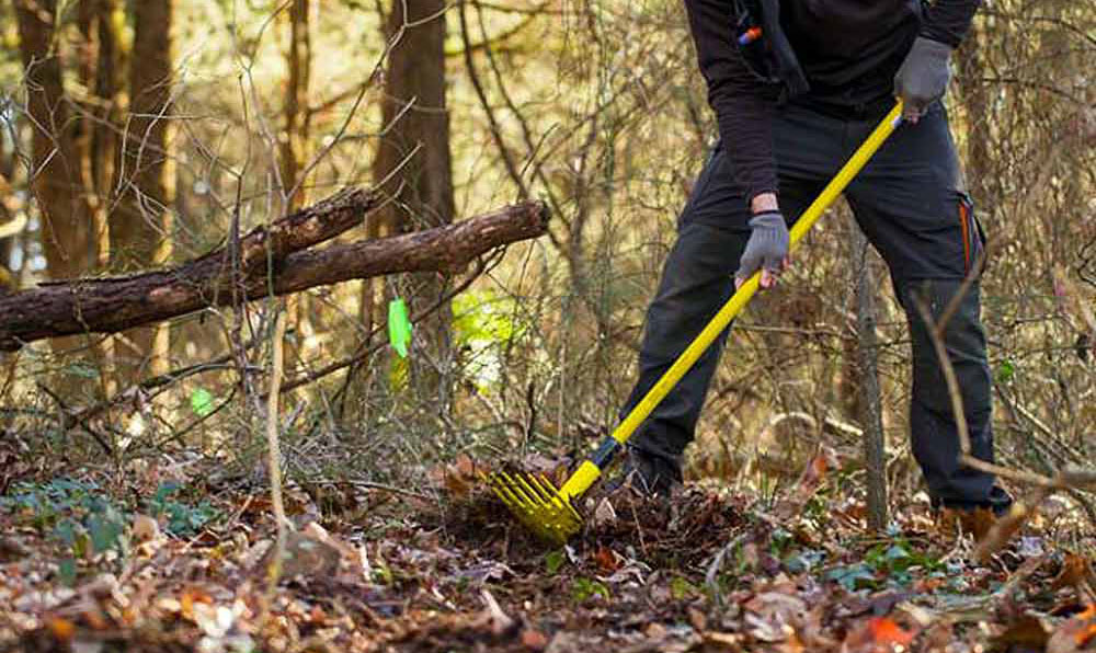 Why do people volunteer to build mountain bike trails?