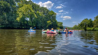 Drifting in a tube down the river.