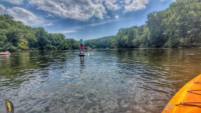 Paddleboarding the river.