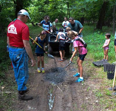 Getting the kids involved in trail work.