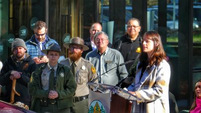 Katherine Andrews announcing the Maumelle Pinnacles Recreation Master Plan at the Pinnacle Mountain State Park visitor center opening.