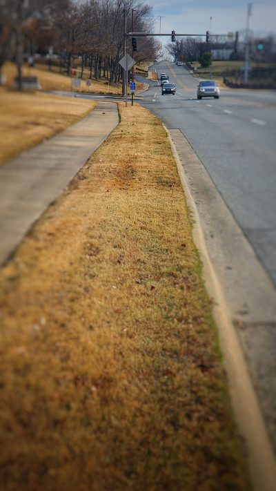 The Arkansas River Trail looking east along Cantrell Road in front of Dillard's Headquarters.