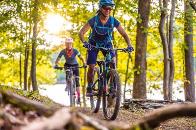 Mountain bikers riding the Monument Trails at Hobbs State Park-Conservation Area.