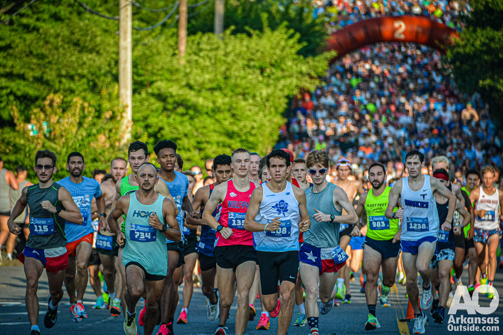 Runners make their way through the Heights neighborhood.