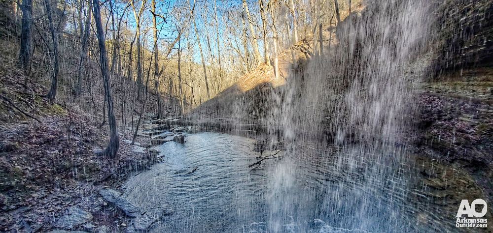 Photo from behind a waterfall.