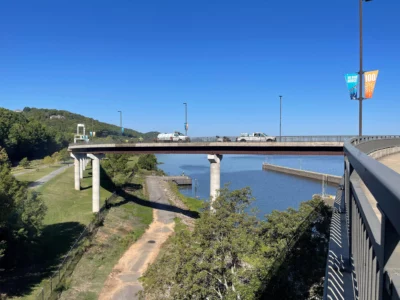 A crew from Pulaski County pressure washes the southwest ramp of the Big Dam Bridge as part of an effort to give the iconic structure a facelift on Oct. 2, 2024.