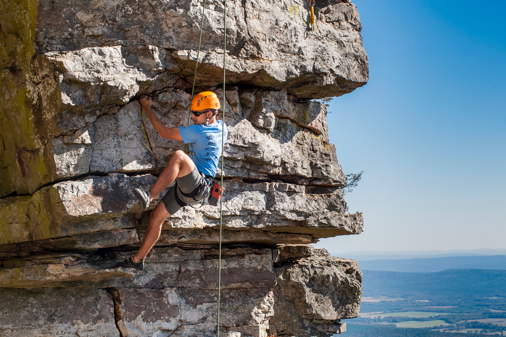 Climber on an exposed section of rock.