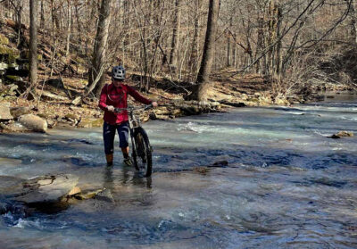 Wet crossing are one of the things to be prepared for when riding an IMBA Epic in the Winter. (Photo by Kelly Newberg)
