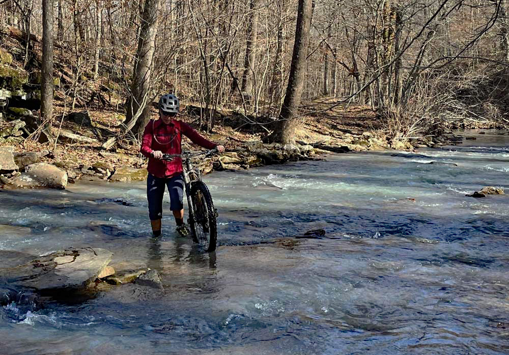 Wet crossing are one of the things to be prepared for when riding an IMBA Epic in the Winter. (Photo by Kelly Newberg)