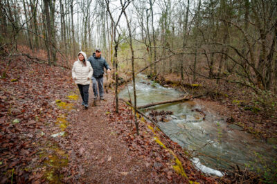 A couple enjoying the Enders Fault Trail at Woolly Hollow State Park.