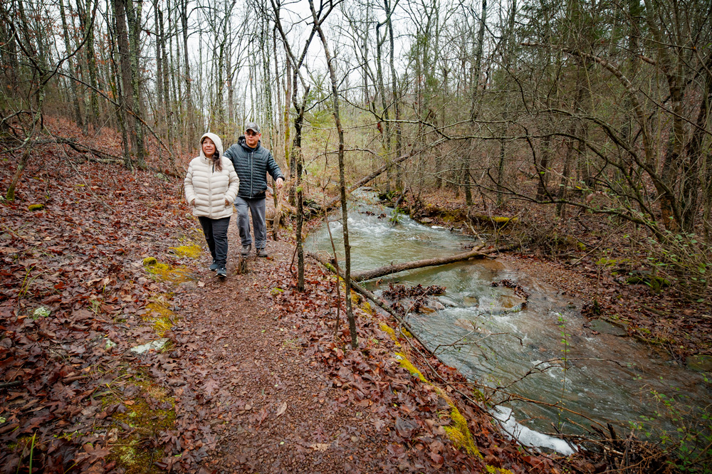 A couple enjoying the Enders Fault Trail at Woolly Hollow State Park.