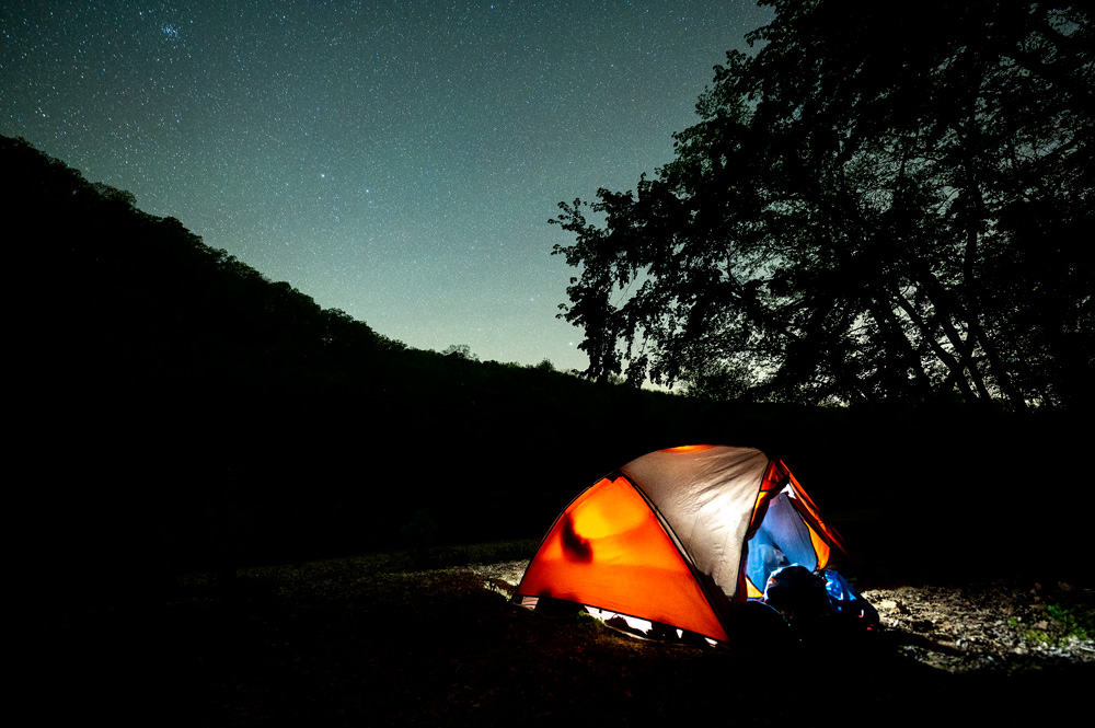 Camping on the Buffalo National River. (Photo courtesy of ADPHT)