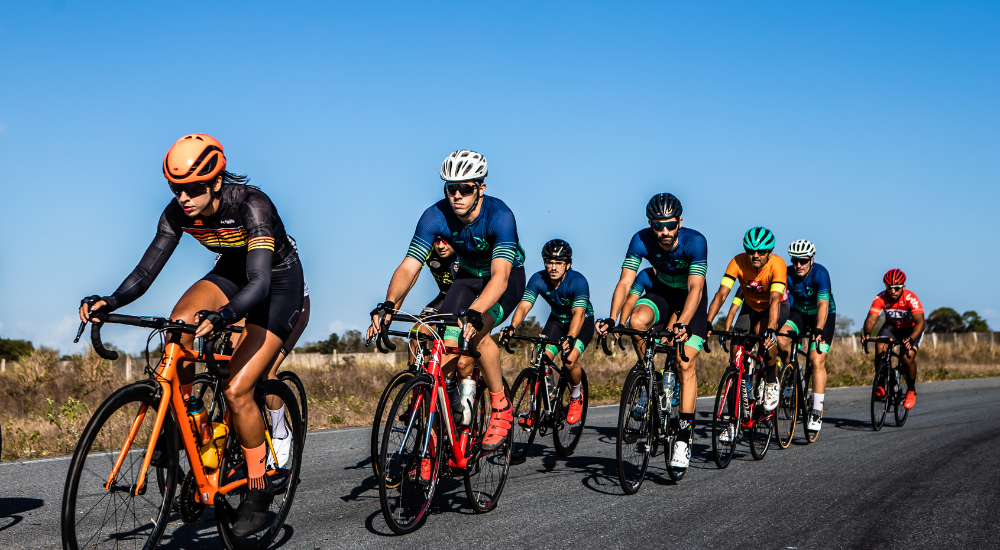 A peloton of road cyclists.