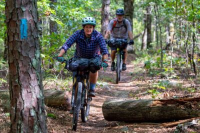 Bikepackers riding the Ouachita National Recreation Trail, a trail system in line to be positively improved by the BOLT Act.