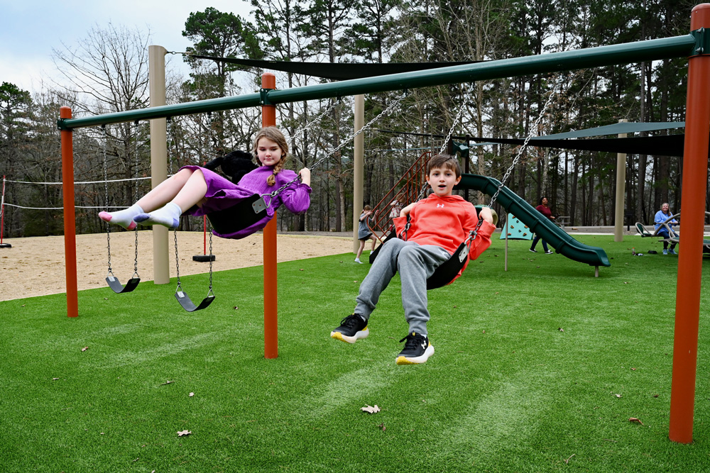 Kids enjoying the new playground.
