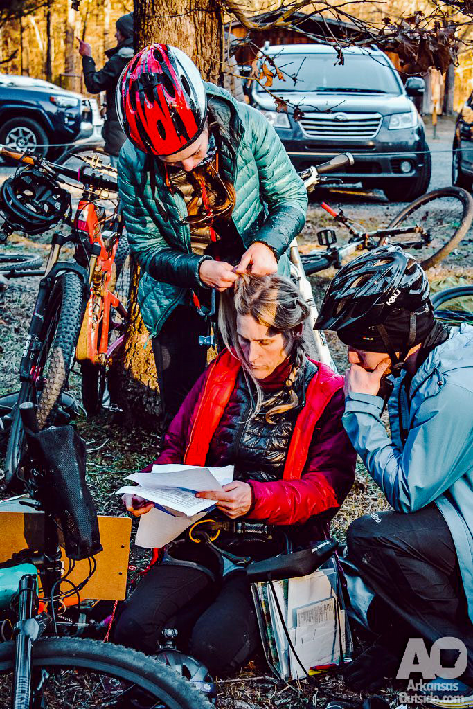 Teammates taking care of each other during the 2022 Raid the Rock Adventure Race.