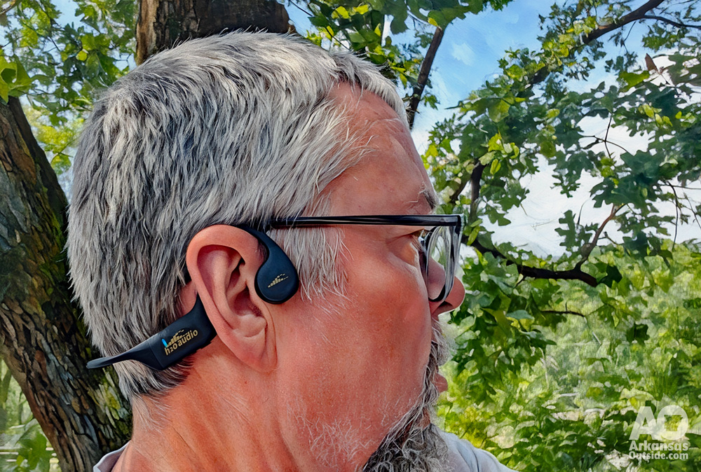Bluetooth headphones fit comfortably over the ear while leaving your ears open to hear ambient sounds.