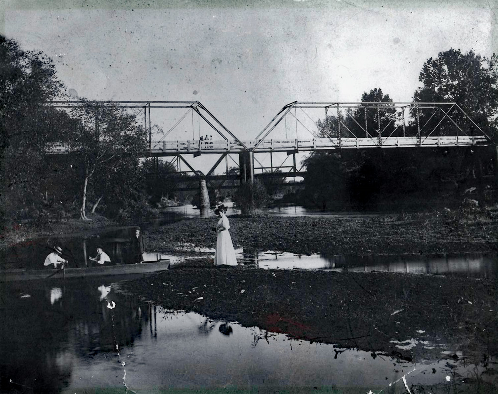 1899 photo of the Old River Bridge over the Saline River.