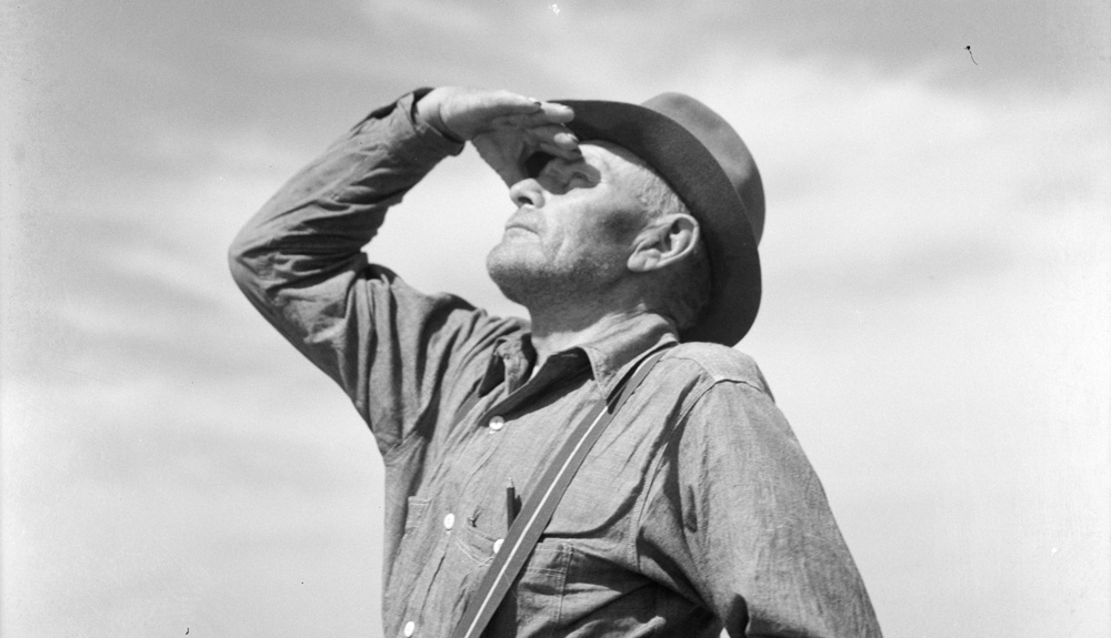 Arthur Rothstein (New York, New York, 1915 - 1985, New Rochelle, New York), Mike Sullinger Who Has a Farm Near Carson, North Dakota, Looks for Rain, 1936, gelatin silver print, 17 3/4 x 14 3/4 in. On loan from the Bank of America Collection. The Long View exhibit Arkansas Museum of Fine Arts