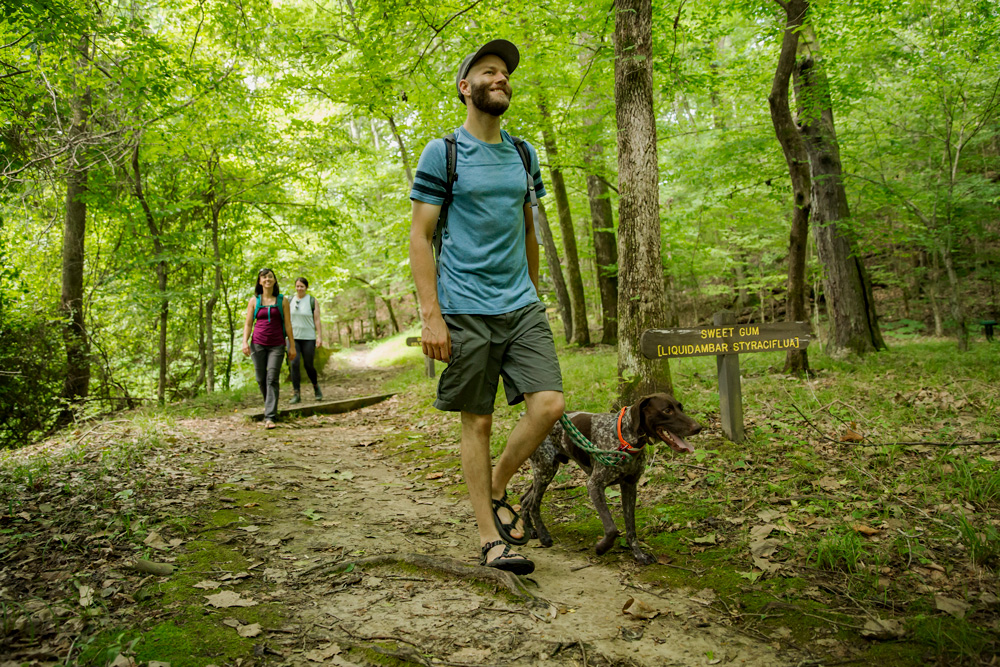 A stroll with your best friend at Village Creek State Park. (Photo courtesy of ADPHT)