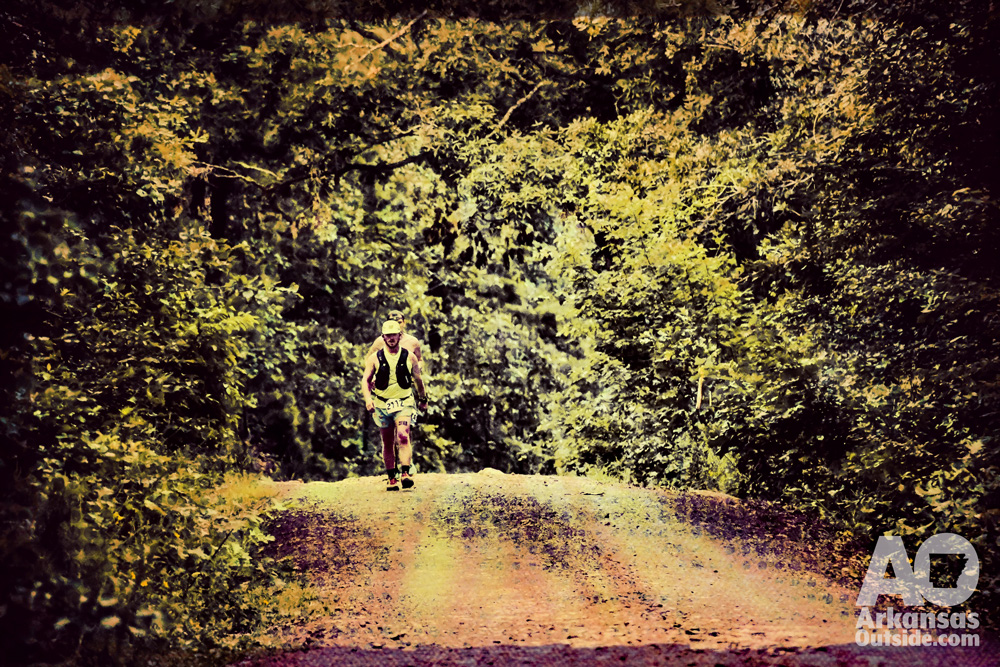 Runner on a gravel road. Arkansas outdoor heat safety
