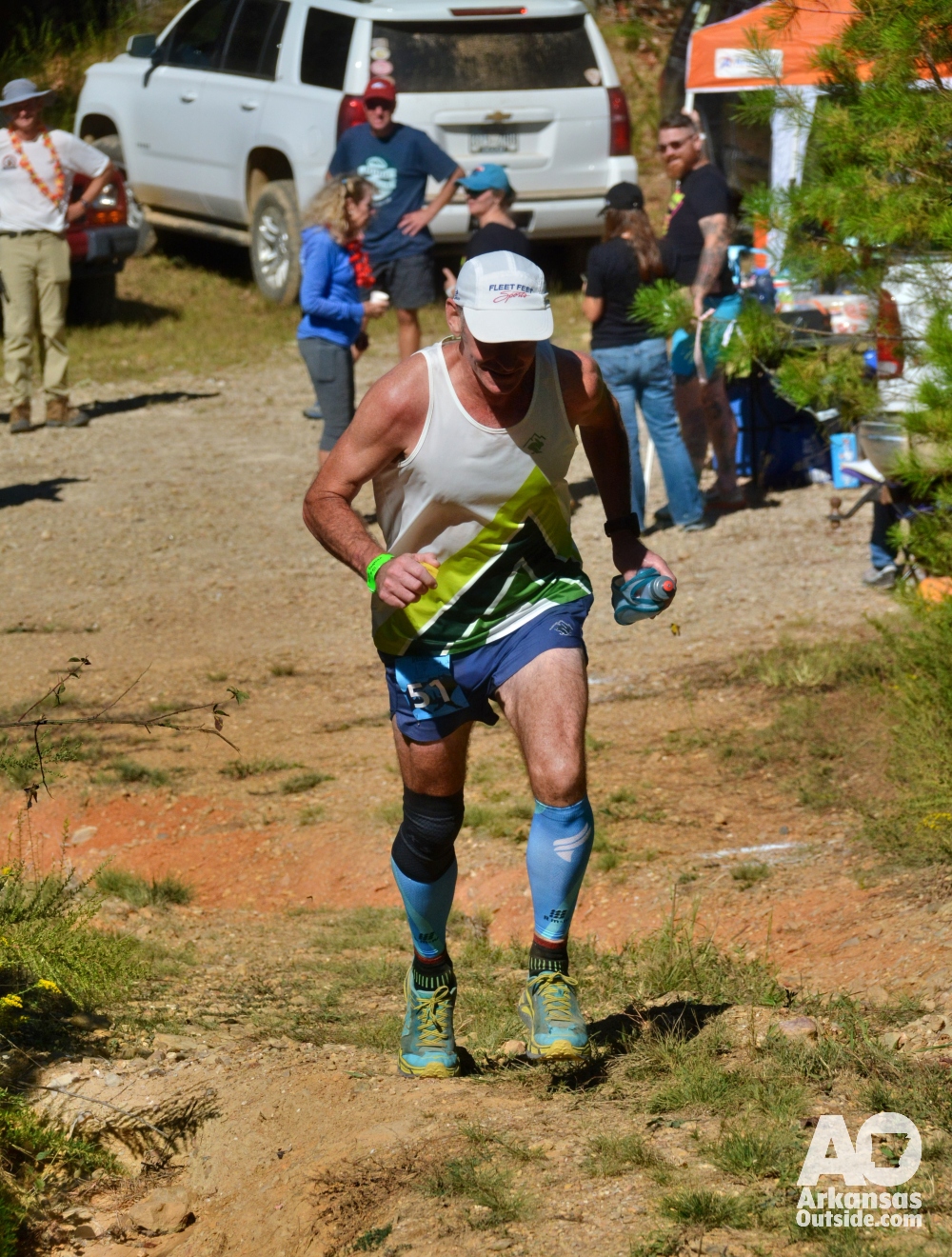 Fed and encouraged, a runner leaves the Bahama Mama aid station.