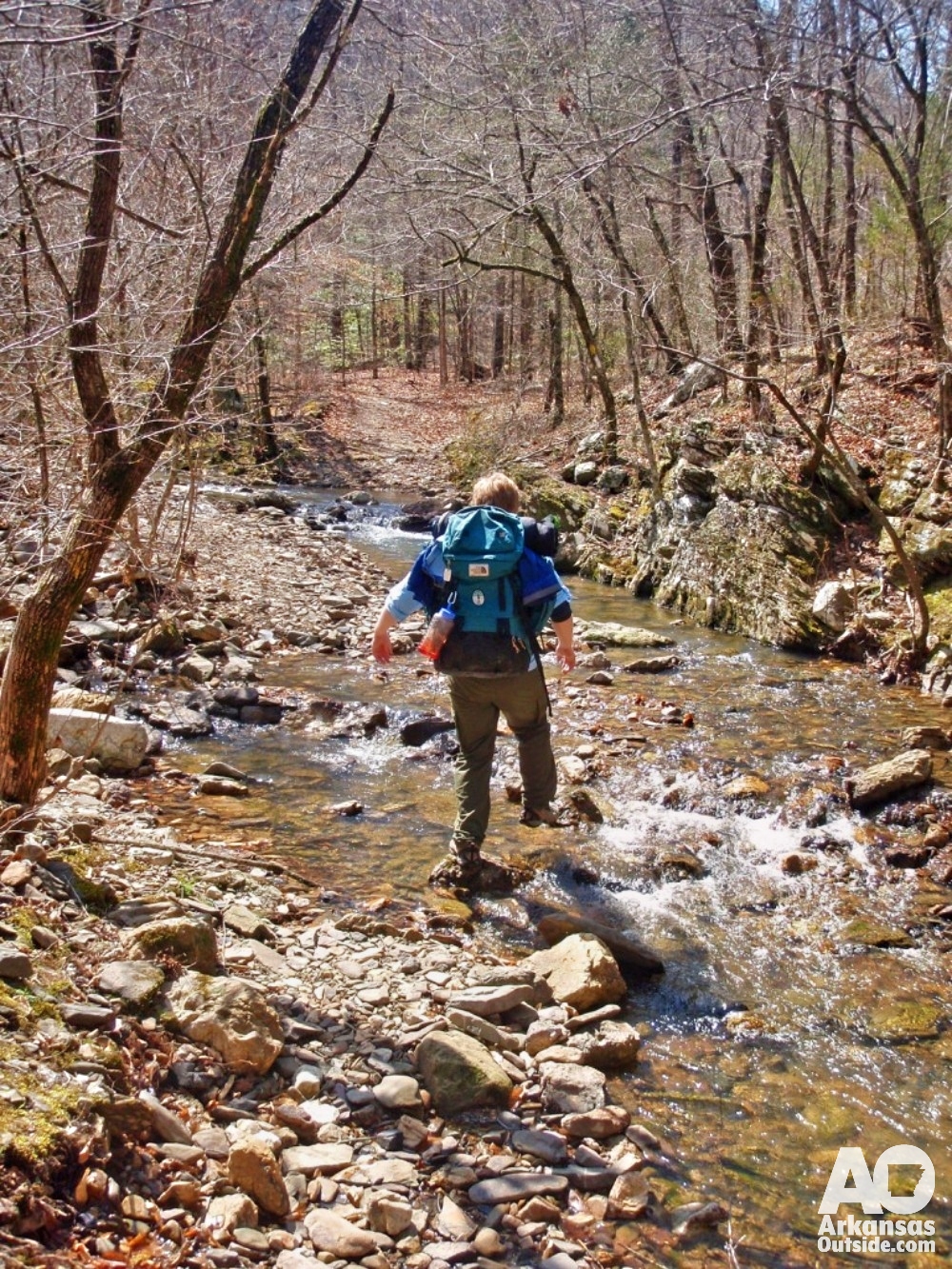 David dances on the rocks across Viles Branch Creek.