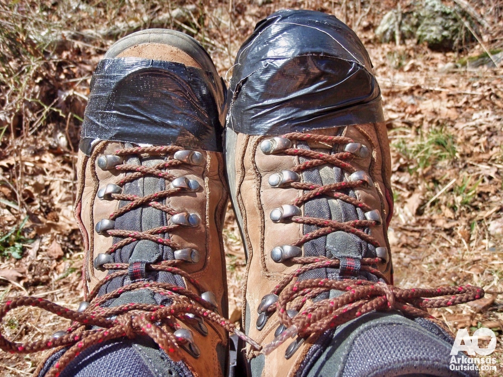 Duct tape holding boot sole on hiking trail in the Ouachita National Forest, Arkansas