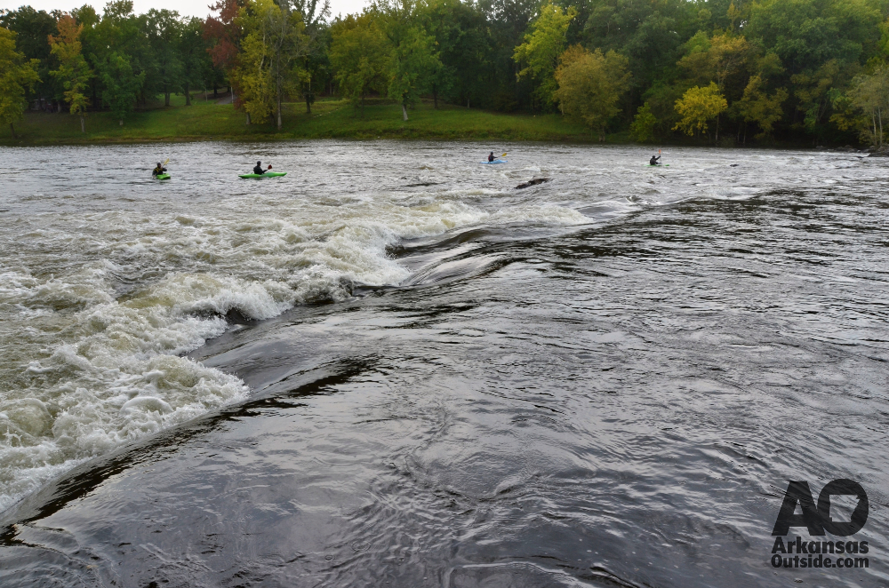 Kayakers playing at Rockport Ledge during recreational generation.