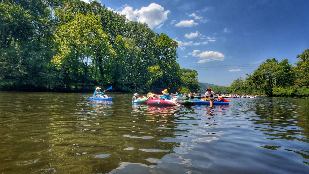 Tubing is very popular due to the cool water and the hot summer day.