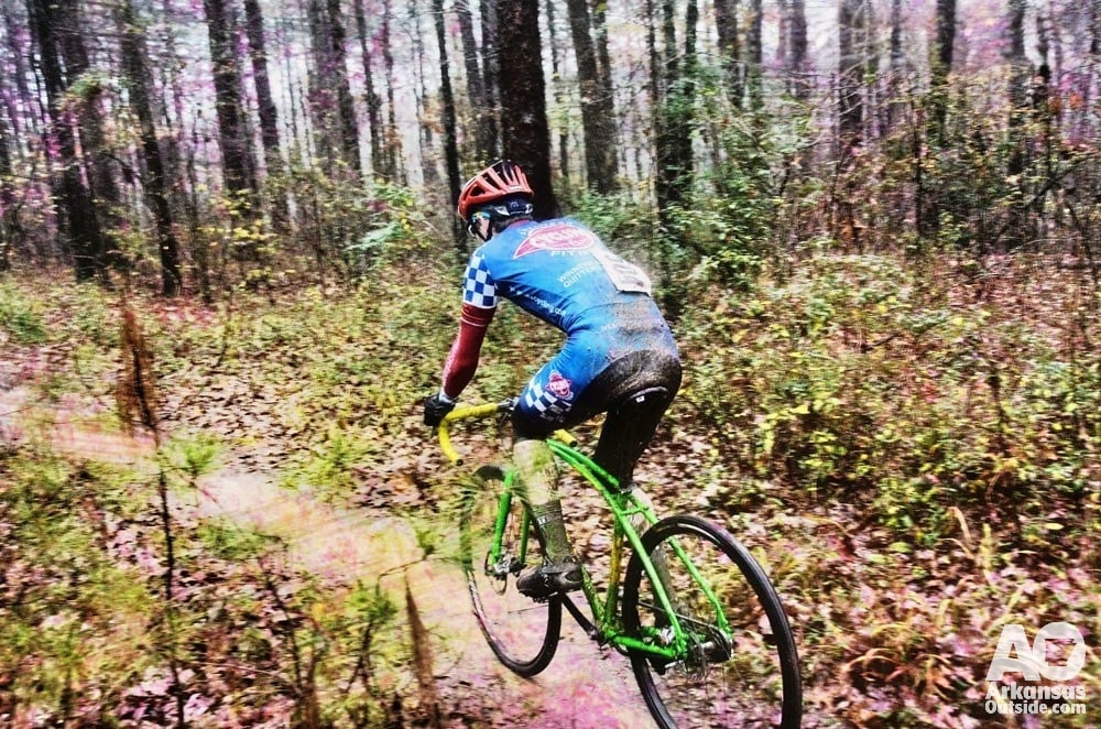 Through the woods on skinny tires, and it's cold and raining.
